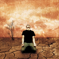 man-on-knees-surrendering-to-god-cracked-dry-ground[1]