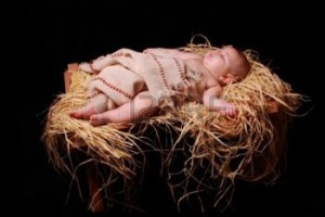 7352204-baby-jesus-asleep-in-the-manger